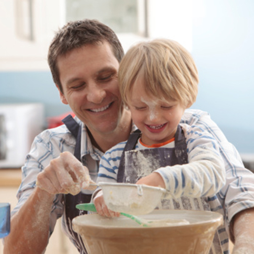 father and son baking together