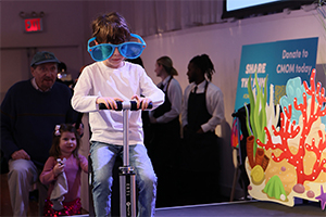 boy on a scooter