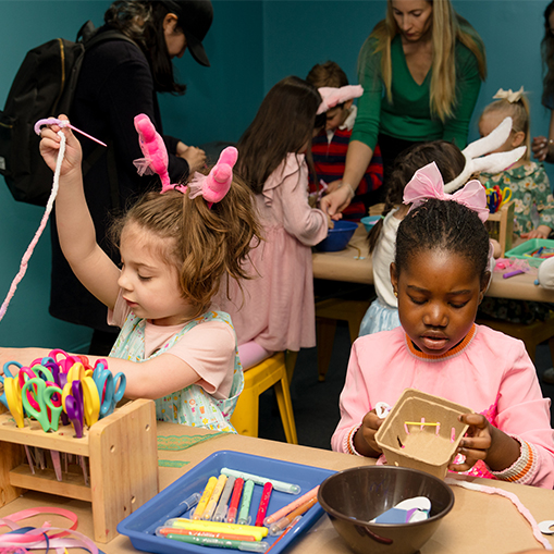 two little girls making arts and crafts
