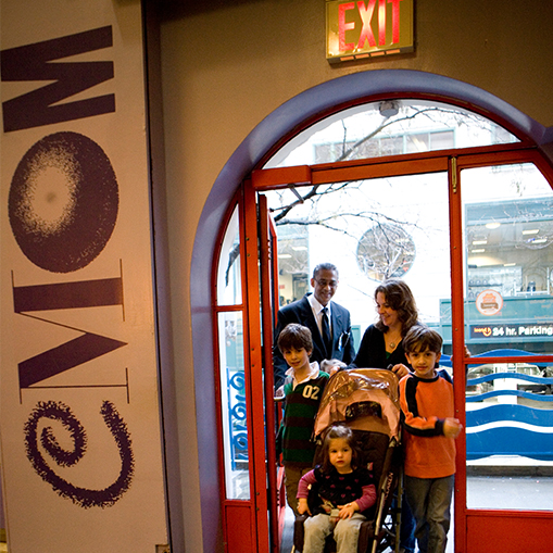 family entering a museum