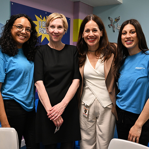 four women standing together