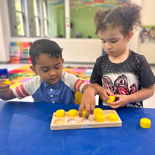 two children doing a science experiment