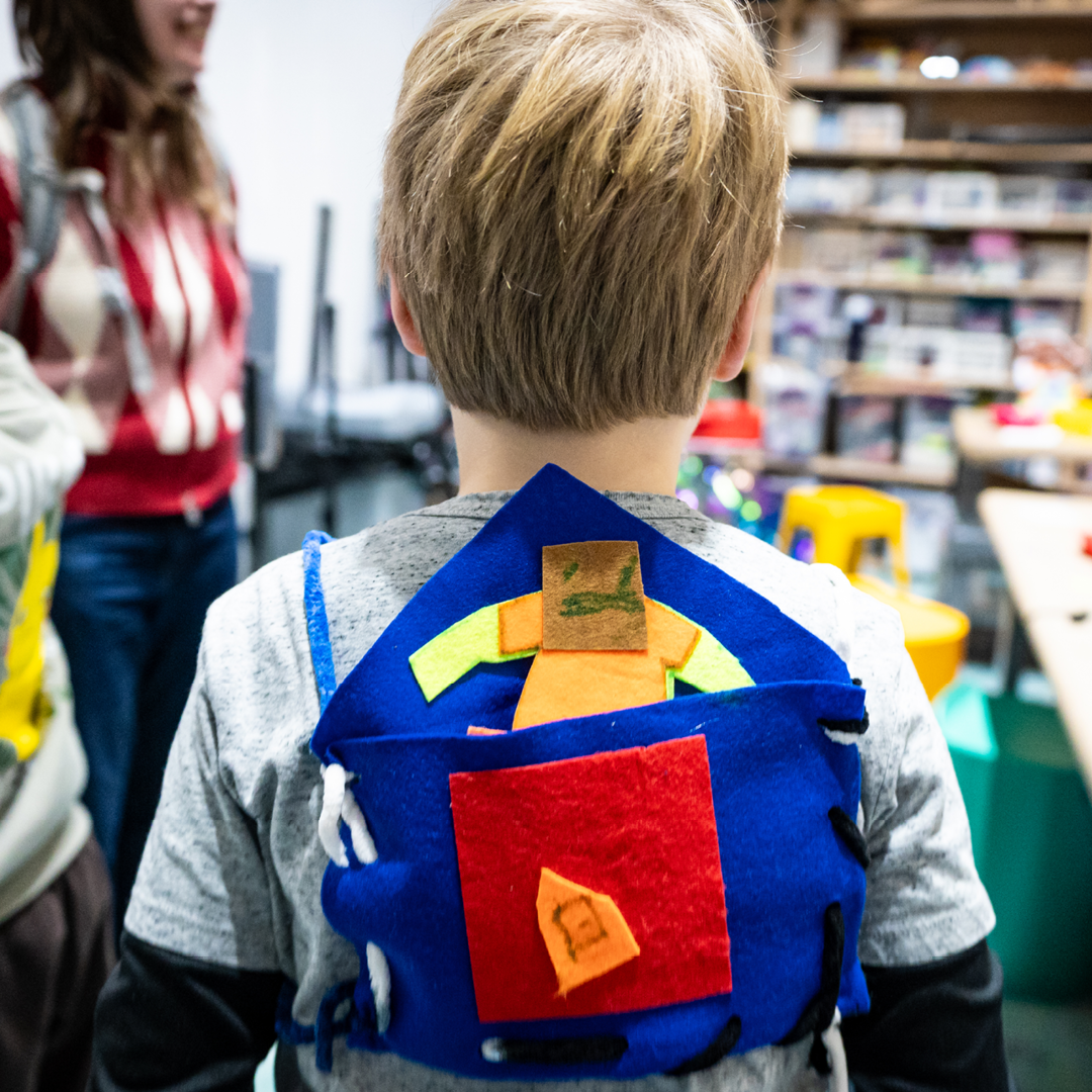 Child wear a backpack they made